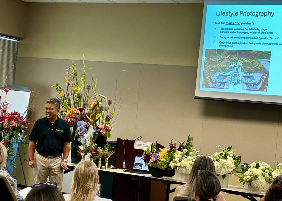 Renato Cruz Sogueco teaching a session on lifestyle photography for florists